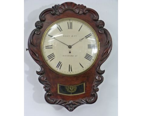 An early 19thC mahogany trunk-dial Wall Clock, by Vogt & Co. 35 Wigmore St., with circular dial and black Roman numerals, sin