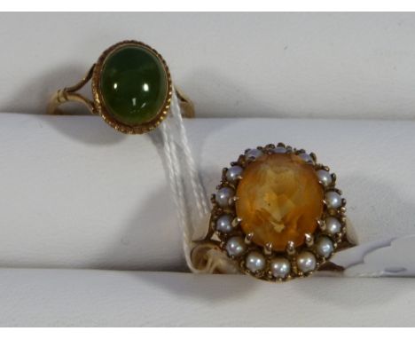 A large facetted oval citrine Ring, surrounded by small cultured earls, all set in 9ct yellow gold, Size M together with a sm