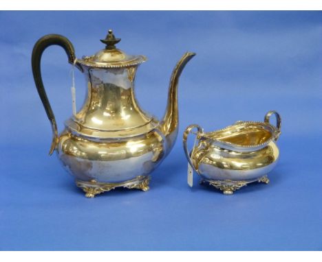 A George V silver Coffee Pot and Sugar Bowl, by Atkin Brothers, hallmarked Sheffield, 1911, of ovoid form with shell and gadr