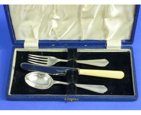 A George VI silver and steel Knife, Fork and Spoon set, hallmarked Sheffield, 1947, in fitted presentation case, approximate 