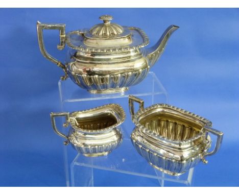 A George III silver Teapot and Cream Jug, by Robert & Samuel Hennell, hallmarked London, 1809 and 1810, of squat ovoid form w