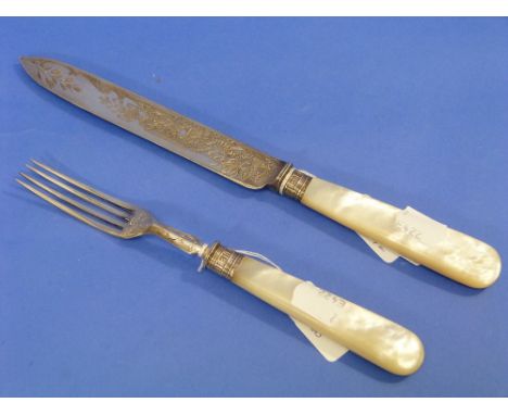 A Victorian ornate mother-of-pearl handled silver Serving Knife and Fork, by Harrison Bothers & Howson, hallmarked Sheffield,