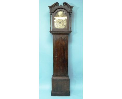 An oak Longcase Clock, the 30-hour movement striking on a bell, arched brass and silvered dial with Roman and Arabic numerals