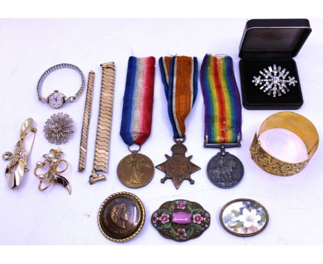 Selection of Three World War One (WW1) Medals and a selection of Costume Jewellery.  The WW1 Medals consist of a 1914-1915 St