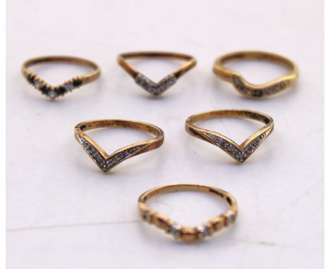 Selection of Six 9ct Gold Diamond and Cubic Zirconia Wishbone Rings.  There are Five Diamond Wishbone Rings and One Cubic Zir