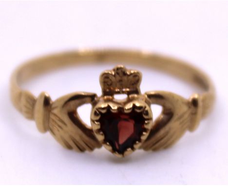 9ct Yellow Gold Heart Shaped Garnet Claddagh Ring.  Ring Size N 1/2.  Total gross weight of the ring is approx. 1.4 grams.   