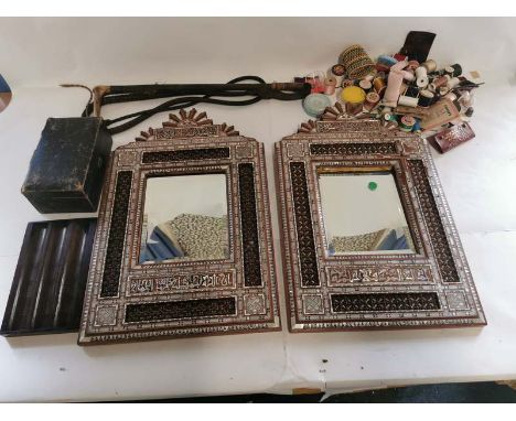 A pair of mother of pearl inlaid Islamic art mirrors, some damage to decoration, over all each 35cm by 54cm. A selection of b