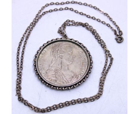 Maria Theresa 1780 Thaler Re-strike Coin Pendant on a Silver Chain.  An impressive size Coin Pendant containing a Re-strike o