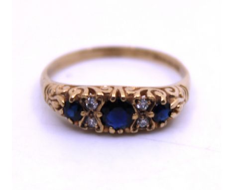 9ct Yellow Gold Sapphire and Illusion Set Diamond Ring.  The Total Carat Weight of the Three Round Brilliant Cut Sapphires is