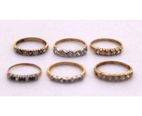 Selection of Six 9ct Gold Dress Rings.  Most of the rings contain Cubic Zirconia stones.  Ring Sizes are M, N and O 1/2. Ther