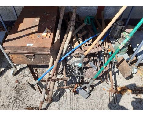 Large collection of garden tools, tin trunk, paraffin lamps etc