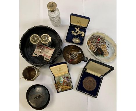 Part shelf of collectables, including commemorative coins, silver cross small items of plateware &amp; costume jewellery &amp