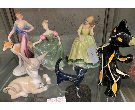 Shelf of china ornaments including a Lladro donkey