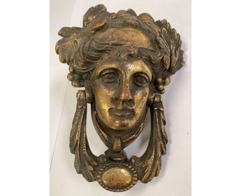 Very decorative door knocker in the form of a face