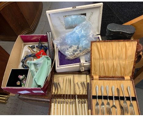 Shelf of mainly costume jewellery, cased pair of opera glasses &amp; cased pair of binoculars 