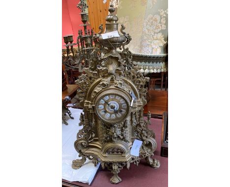 French style "reproduction" eight day garniture clock, decorative metal case with part white enamel dial, striking the hour a