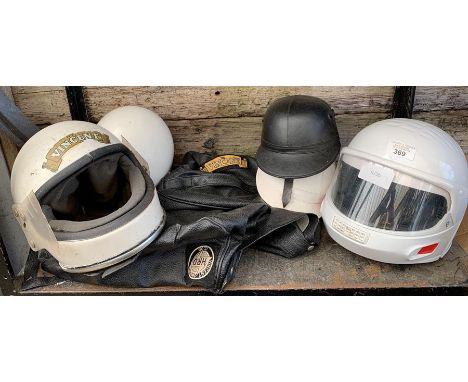 Collection of vintage crash helmets &amp; a Vincent simulated hand cover