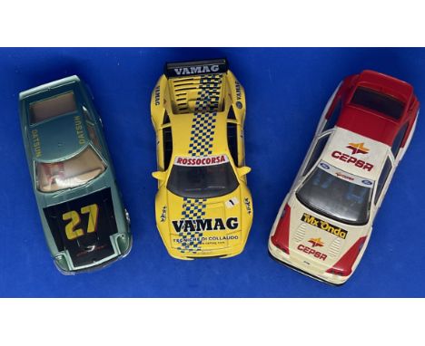 3 x Various Cars in Racing Livery 1:32 Scalextric type slot racing cars unboxed with some ageing fair, good condition. We com