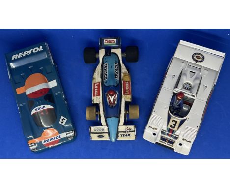 3 x Various Cars in Racing Livery 1:32 Scalextric type slot racing cars unboxed with some ageing fair, good condition. We com