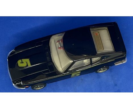 Datsun 260Z no5 1:32 Scalextric slot racing car unboxed with some ageing fair, good condition. We combine postage on multiple