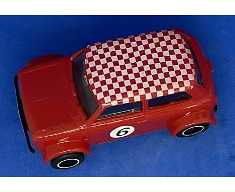 Mini 1275 GT C.122 1:32 Scalextric slot racing car unboxed with some ageing fair, good condition. We combine postage on multi