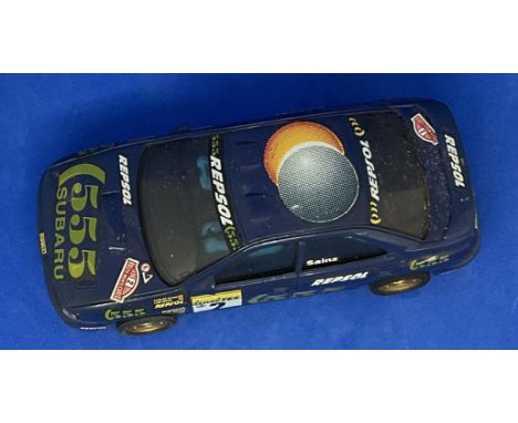 Subaru Rally "Carlos Sainz" no2 1:32 Scalextric slot racing car unboxed with some ageing fair, good condition. We combine pos