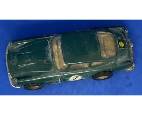 Aston Martin DB4 GT 1:32 Scalextric slot racing car unboxed with some ageing fair, good condition. We combine postage on mult