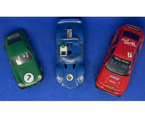 3 x Various Cars in Racing Livery 1:32 Scalextric type slot racing cars unboxed with some ageing fair, good condition. We com