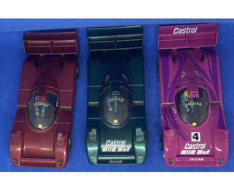 3 x Jaguar Le Mans 1:32 Scalextric type slot racing cars unboxed with some ageing fair, good condition. We combine postage on