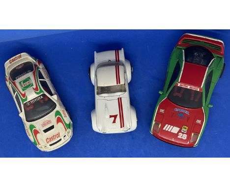 3 x Various Cars in Racing Livery 1:32 Scalextric type slot racing cars unboxed with some ageing fair, good condition. We com