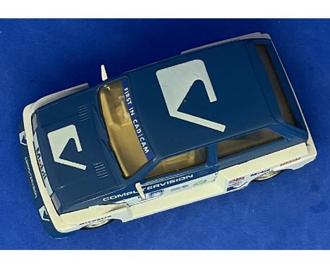 Metro Rally 1:32 Scalextric slot racing car unboxed with some ageing fair, good condition. We combine postage on multiple win