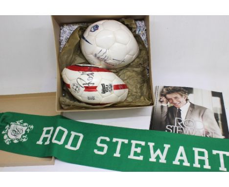 Rod Stewart: Two signed Rod Stewart footballs with a green scarf and tour programme. Each ball (deflated) is signed in black 