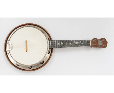 A George Formby Ukelele Banjo - With original George Formby silver printed plaque and c / 2873 on reverse.