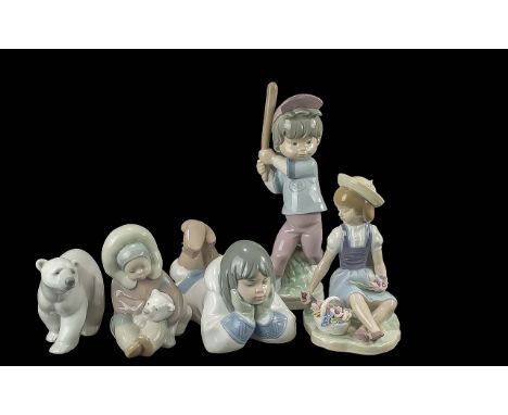 Two Lladro Figures, comprising Sport Billy and a young girl seater with a basket of flowers, together with a Lladro Eskimo gi