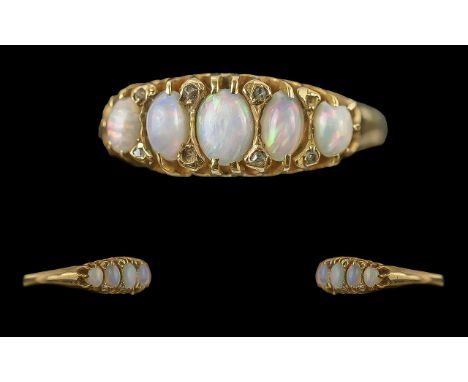 Ladies 18ct Gold Attractive 5 Stone Opal Set Ring, Raised Open Work Setting and Diamond Set Spacers, The Well Matched Opals o