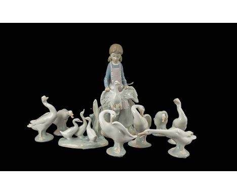 Nao by Lladro Figure of a Young Girl with a Goose, together with a figure set of three Nao Geese.  Together with seven assort