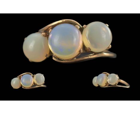 Ladies 18ct Gold Pleasing 3 Moonstone Set Ring not marked - tests high ct gold. Ring size K-L weight 4.1 grams. Shank and set