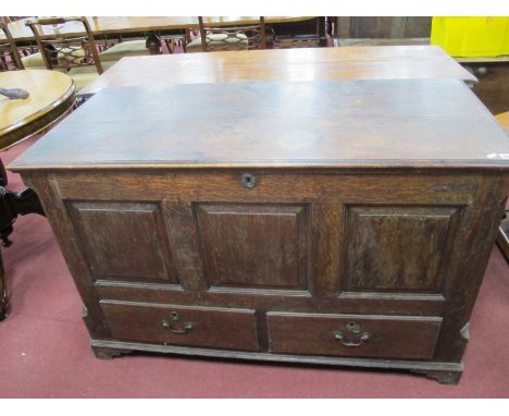 An XVIII Century Oak Mule Chest, with hinged top, triple panelled base over two drawers on bracket feet, 77cm high, 120cm wid