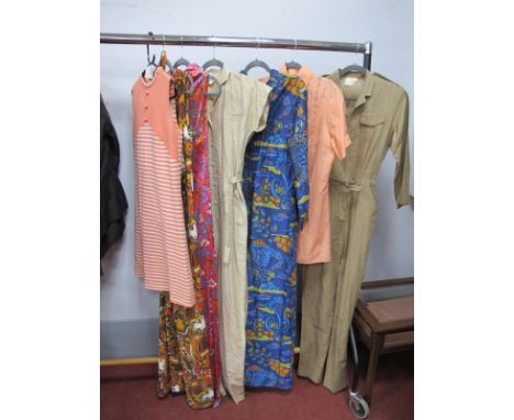 A c.1970's Courtelle Sleeveless Tunic and Two Pairs of Matching Bell Bottom Trousers, five 1970's jump suits and a blouse. (9