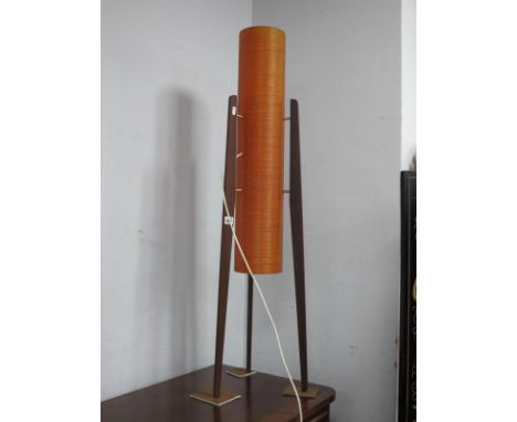 A 1960's Floor Standing Rocket Lamp, with orange spun fibre glass shade, on three shaped teak legs, united by brass pins, 113