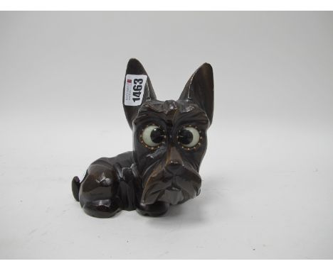 A German Carved Composite Novelty Scottie Dog Clock, with rolling eyes to tell the time, 14cm high.