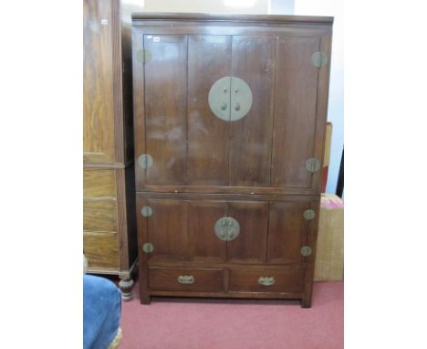 A Chinese Stye Wedding Chest, the top with brass lock plates to folding doors, the base with folding doors, internally with f