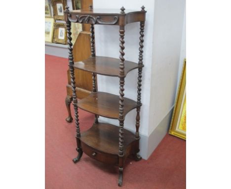 A XIX Century Rosewood What-Not, with turned finials, the frieze with 'C' scroll decoration, four shelves and single drawer o