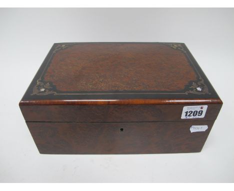 A XIX Century Amboyna Box, the top with ebony crossband, brass and mother of pearl lnlay, lined interior, 26cm wide.