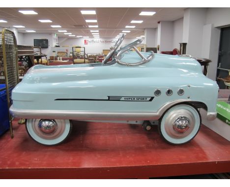 A Super Sport Tin Plate Comet Child's Pedal Car, in the 1950's manner, light blue, Reg FHN 1, approximately 94cm long.Lot 136