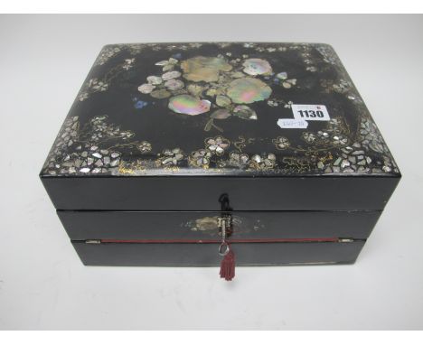 A Mid XIX century Black Lacquered Writing Box, with mother of pearl inset decoration to the lid, the interior with fold-out s