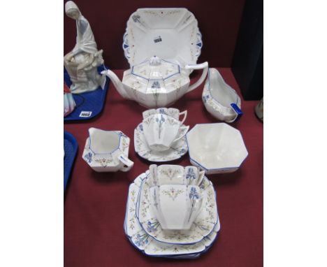 A Shelley Queen Anne Shape Octagonal Teapot, 'Blue Iris' pattern no 11561, bread plate, five side plates plus one cracked, fo