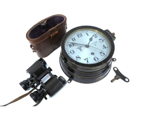 A German Third Reich Kriegsmarine Bulkhead U Boat Clock, Reichsadler with M beneath on Arabic numeral dial, 15990 N to face a