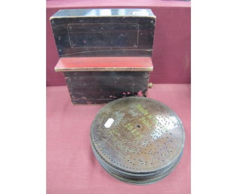A Late XIX Century Polyphone Disc Player, of rectangular form with sloping support, wind-up handle and steel comb, with twelv
