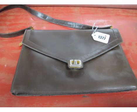 A Vintage Christian Dior Brown Leather Handbag, of envelope style with gilt logo clasp and flat leather strap.